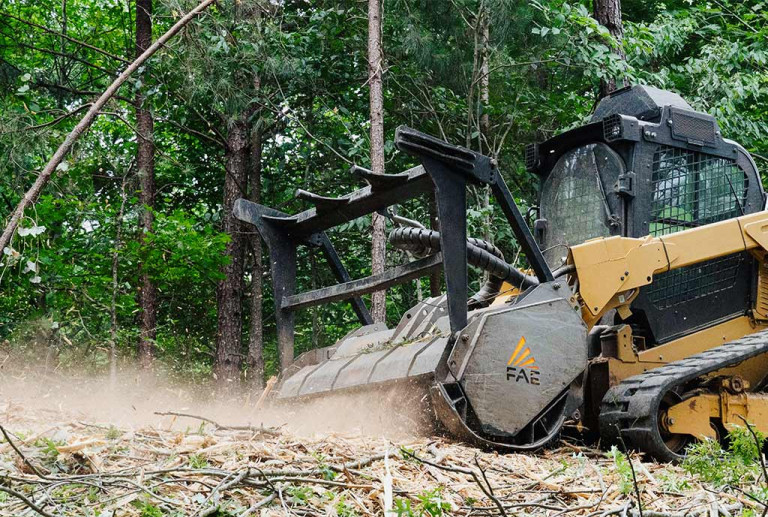 Mulcher attachment for skid steer