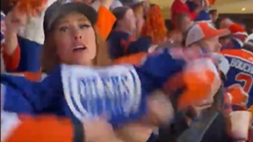 oilers fan flashes crowd